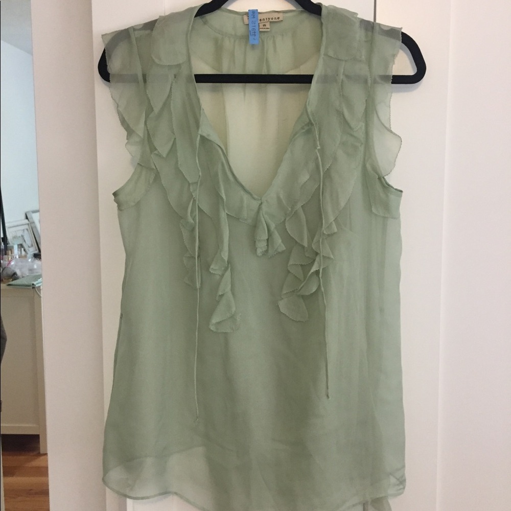 Mint sleeveless ruffled blouse with camisole